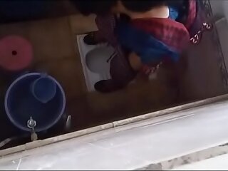 Desi code of practice girl pissing caught in bathroom hidden camera